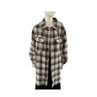 Plaid shirt on a mannequin against a white background