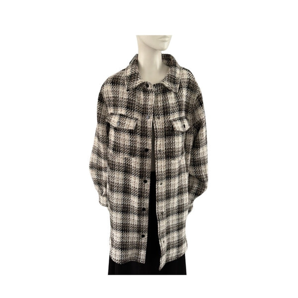 Plaid shirt on a mannequin against a white background