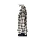 Plaid shirt on a mannequin against a white background