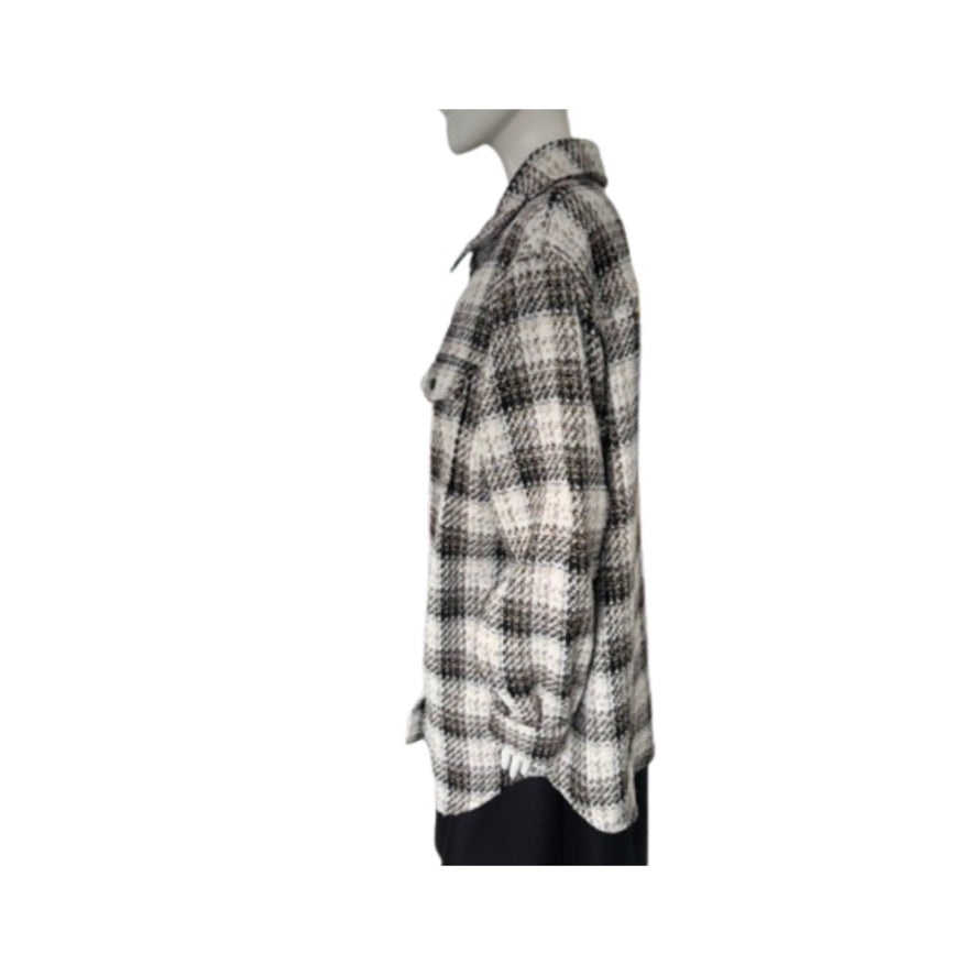 Plaid shirt on a mannequin against a white background