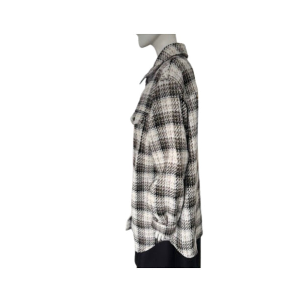Plaid shirt on a mannequin against a white background