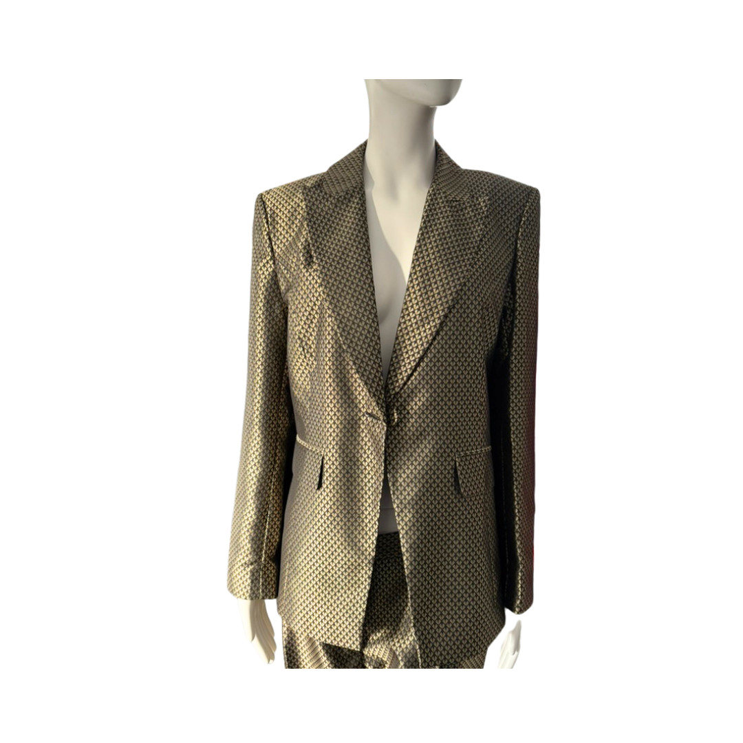 Mannequin wearing a patterned suit jacket on a white background