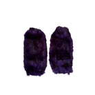 Pair of purple fuzzy cuffs on a white background