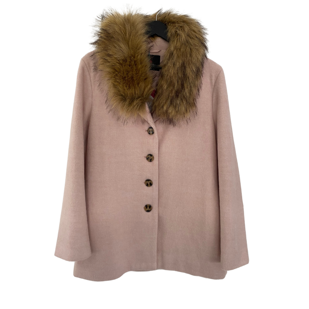 A baby pink faux fur collar swing coat with a detachable brown faux fur collar, long sleeves, and side slit pockets, displayed on a hanger.