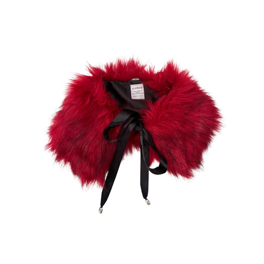 Red fur collar with a black ribbon on a white background