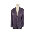 Purple blazer on a mannequin against a white background