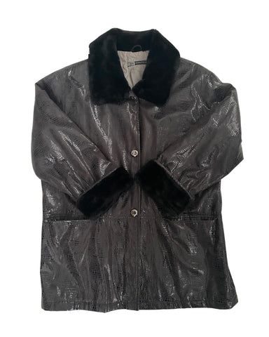 Black shiny jacket with black fur collar and cuffs on a white background