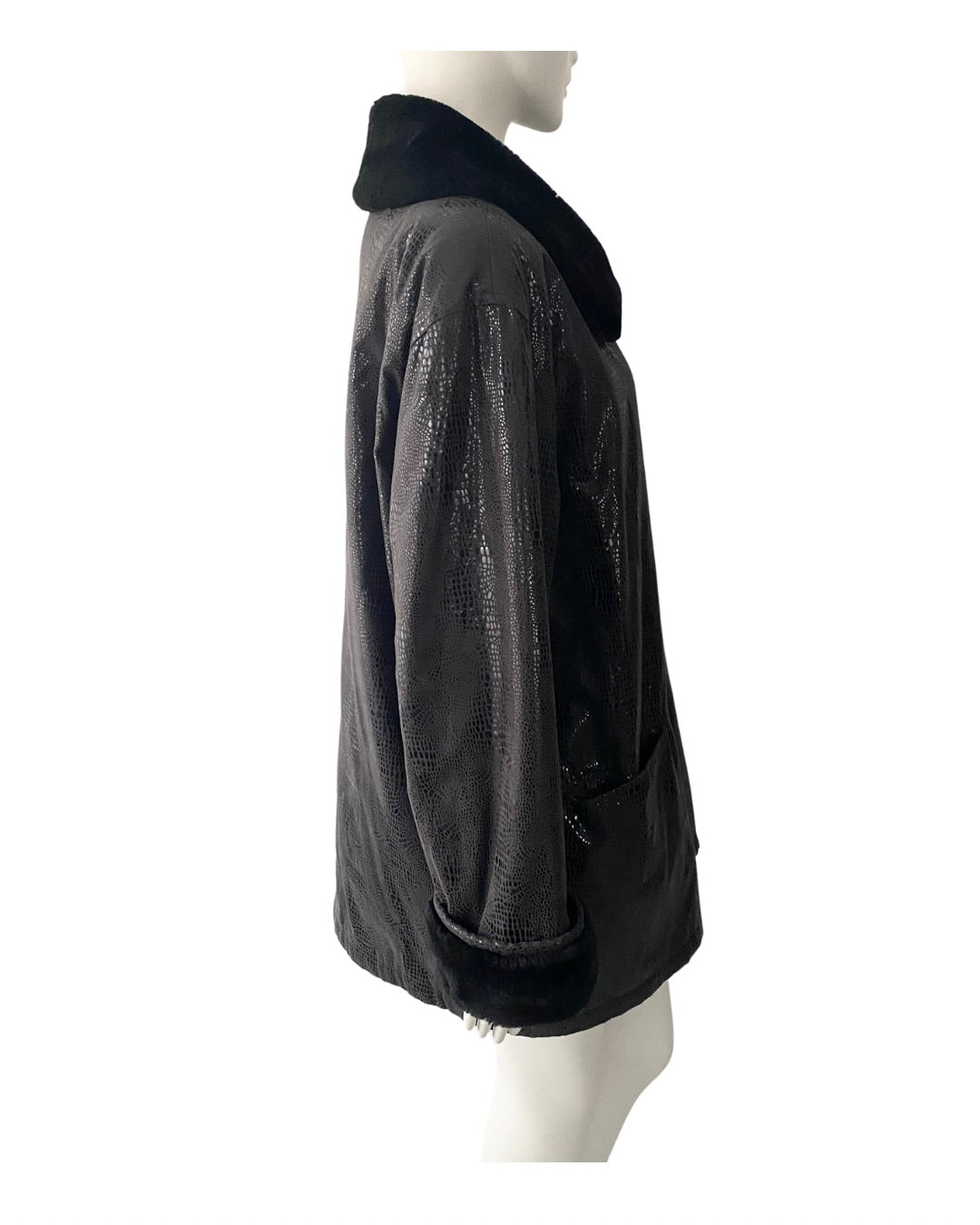 Black leather jacket on a mannequin against a white background