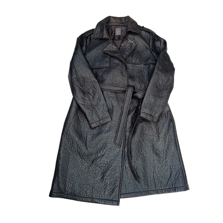 Black quilted coat with a belt on a white background