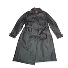 Black trench coat with a belt on a white background