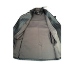 Black coat with textured lining on a white background