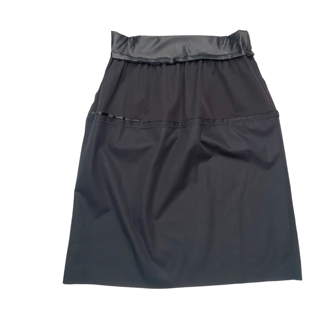 Inside out black skirt on a white background