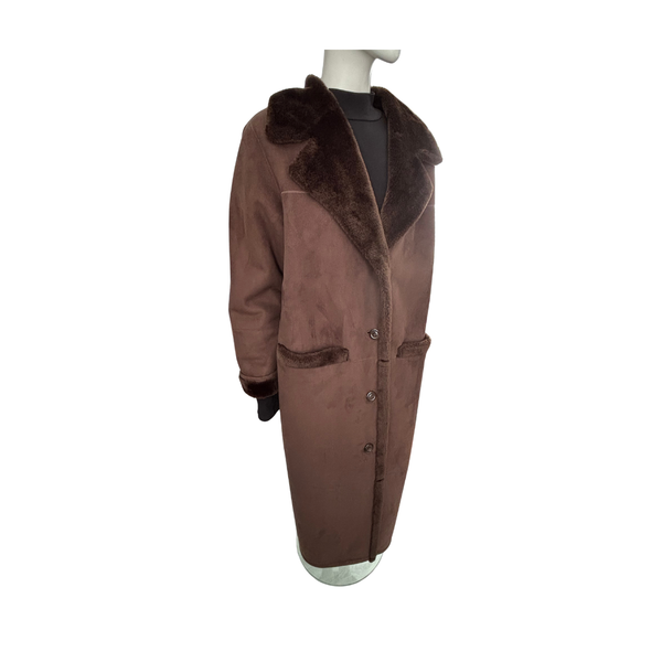 Brown coat with fur collar on a mannequin against a white background