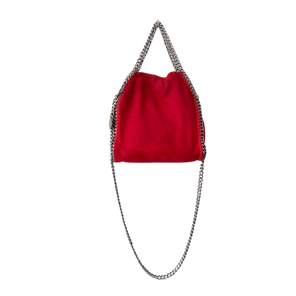 Red bag with a chain detail on a white background