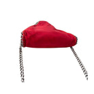 Red fabric pouch with silver chains on a white background