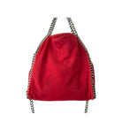 Red handbag with chain details on a white background