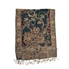Decorative scarf with intricate floral patterns on a white background