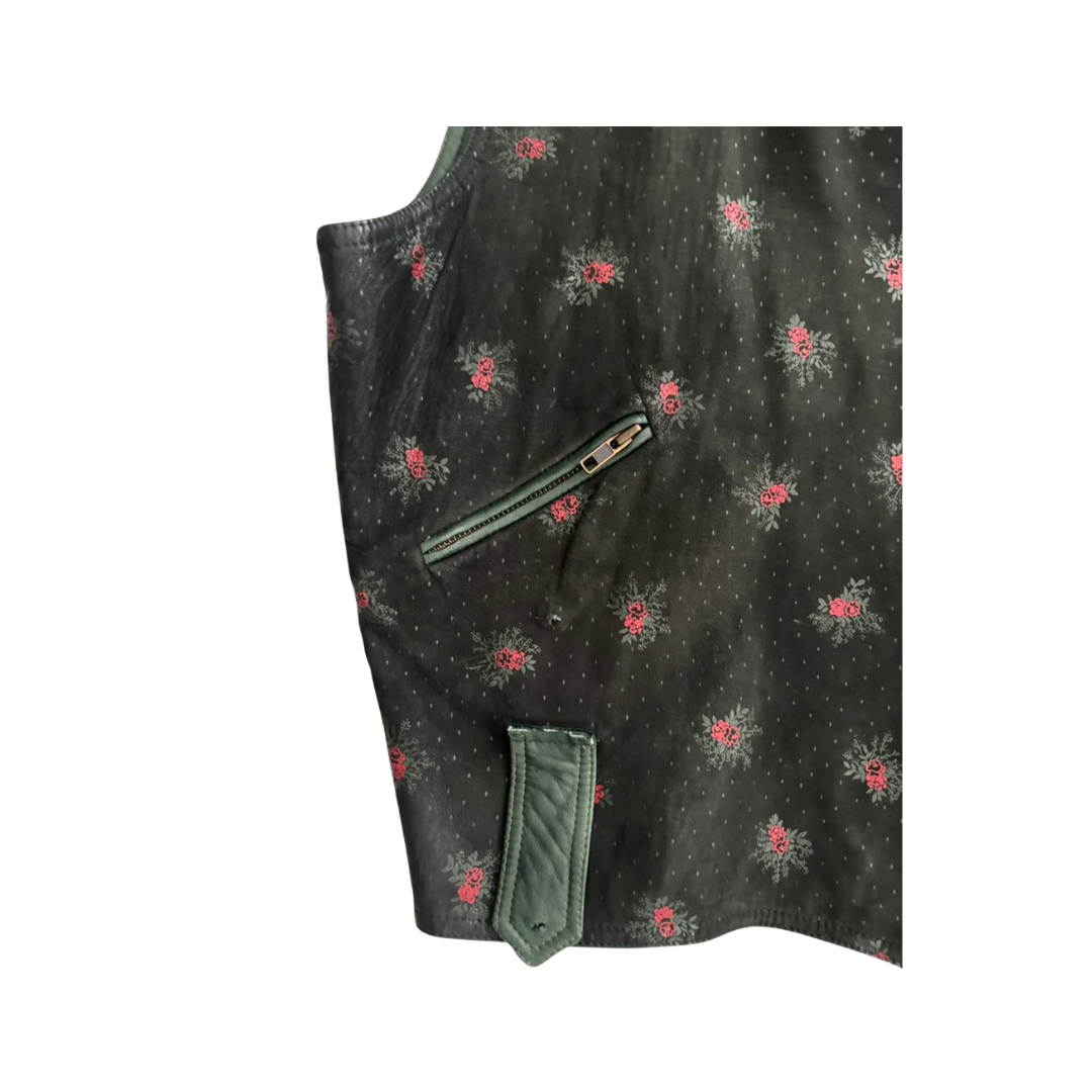 Dark fabric with floral patterns and a zipper pocket on a white background