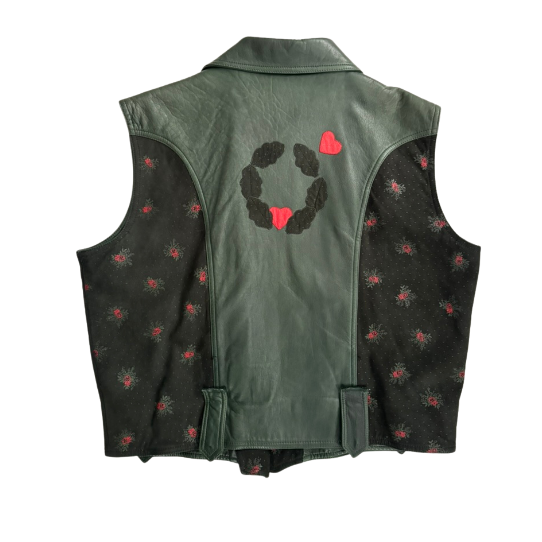 Green vest with floral pattern on a white background