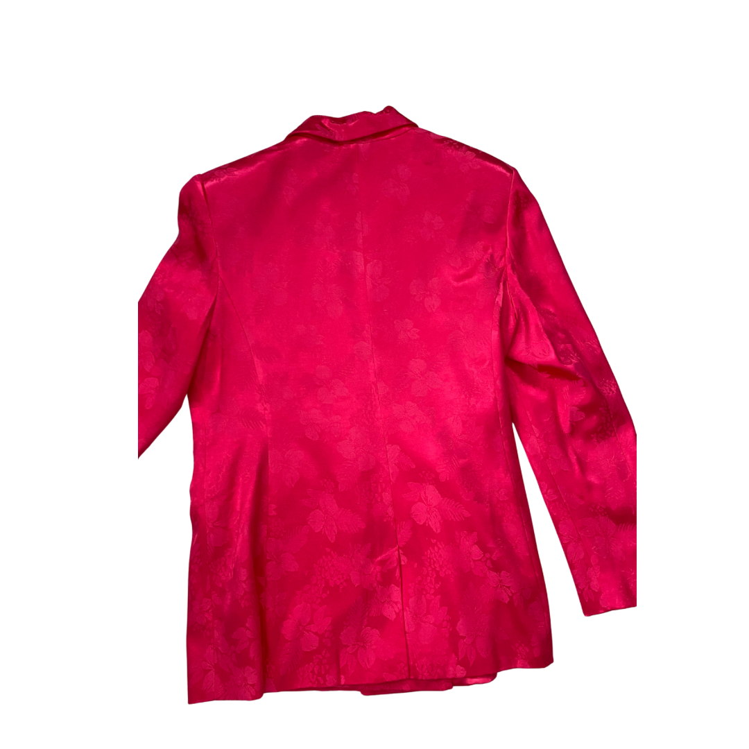 Back view of a red jacket on a white background