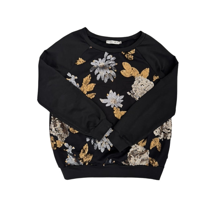 Black sweater with floral patterns on a white background