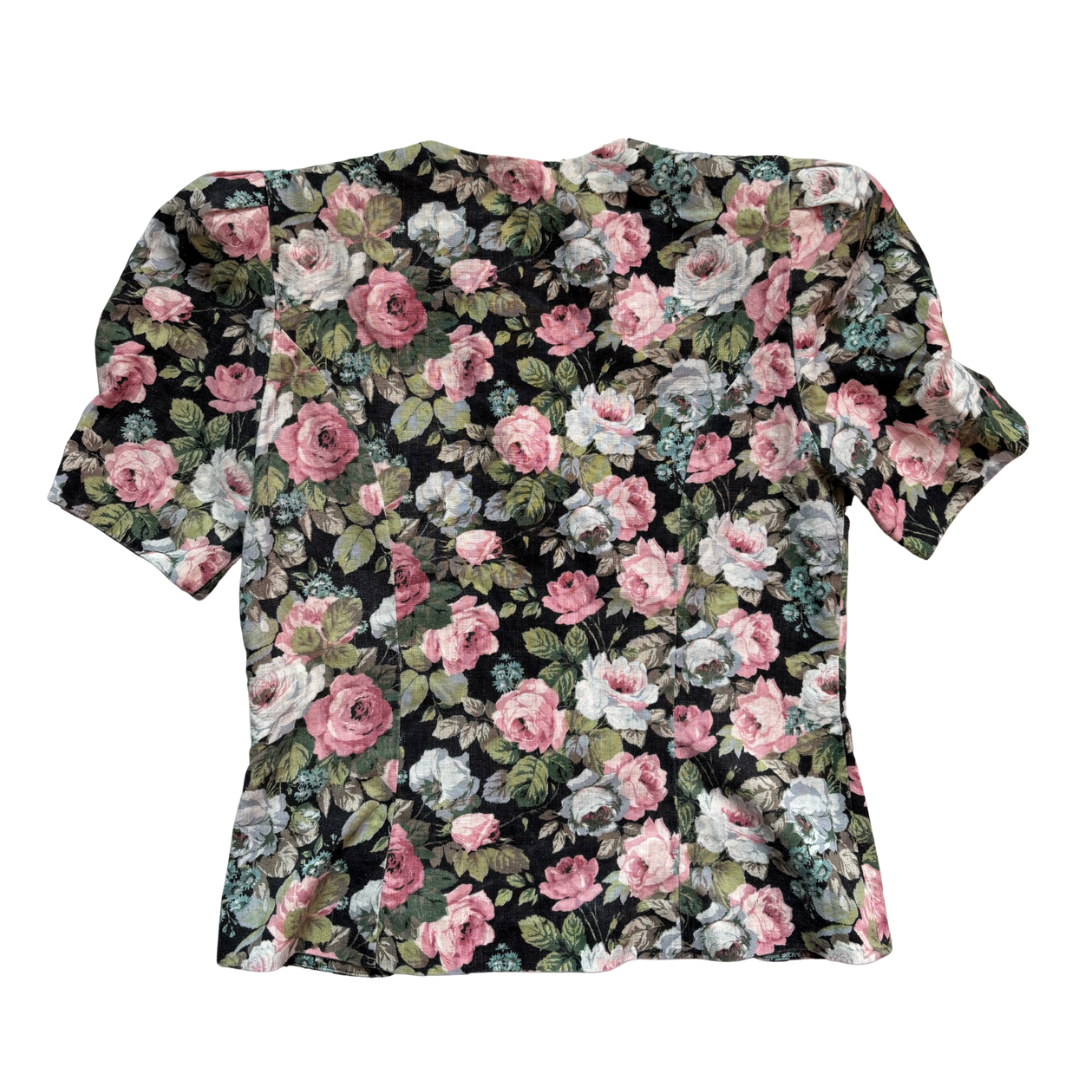 Floral patterned shirt back on a white background