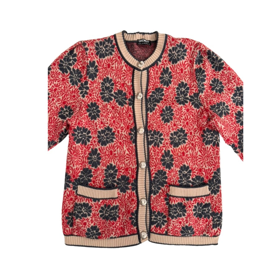 Red and navy floral patterned cardigan on a white background