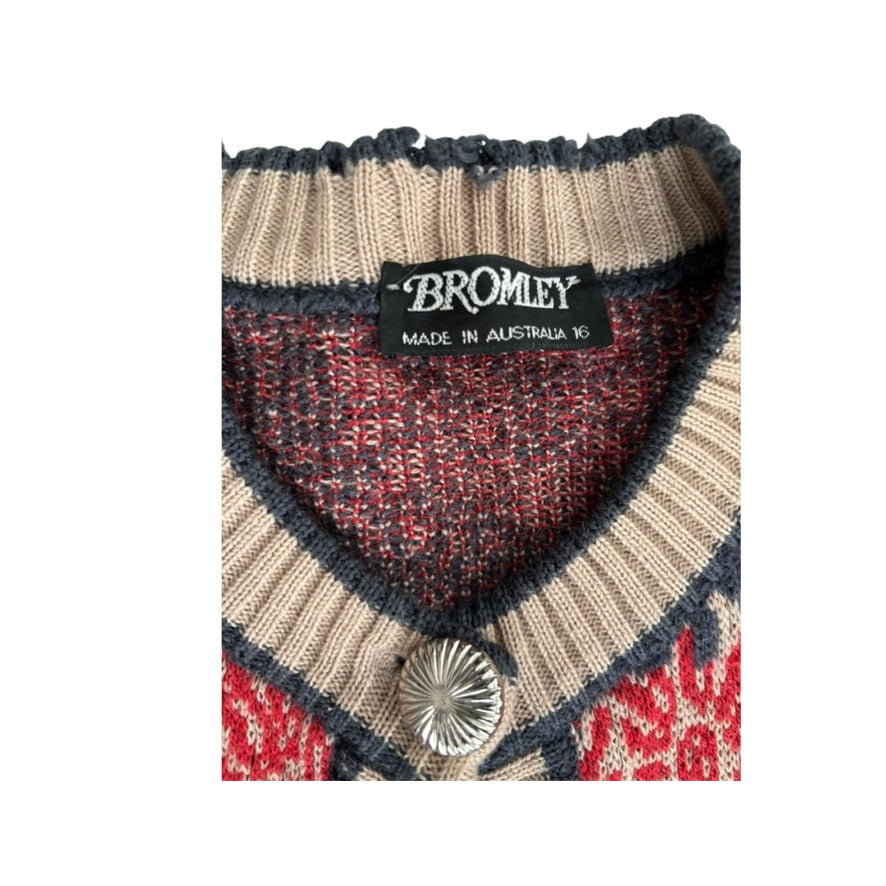 Close-up of a patterned fabric with 'Bromley' label on a white background