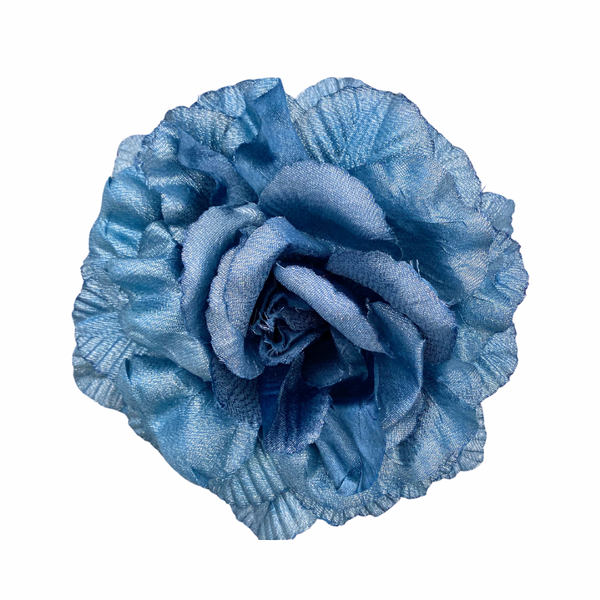 A large blue fabric flower with a vintage style pin fastening.
