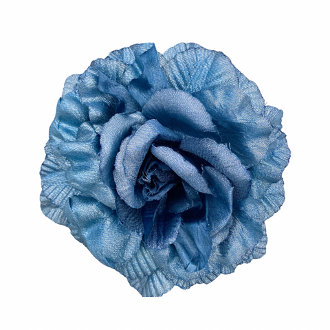 A large blue fabric flower with a vintage style pin fastening.