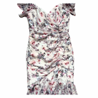 Floral dress with ruched design on a white background