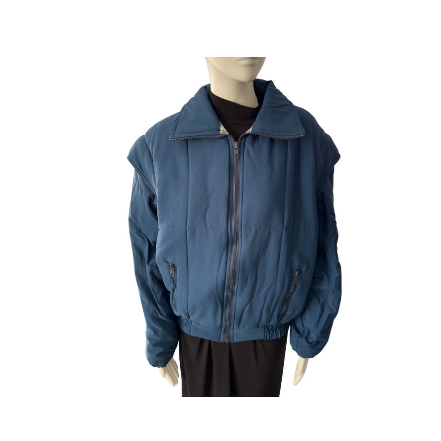 Blue jacket on a mannequin against a white background