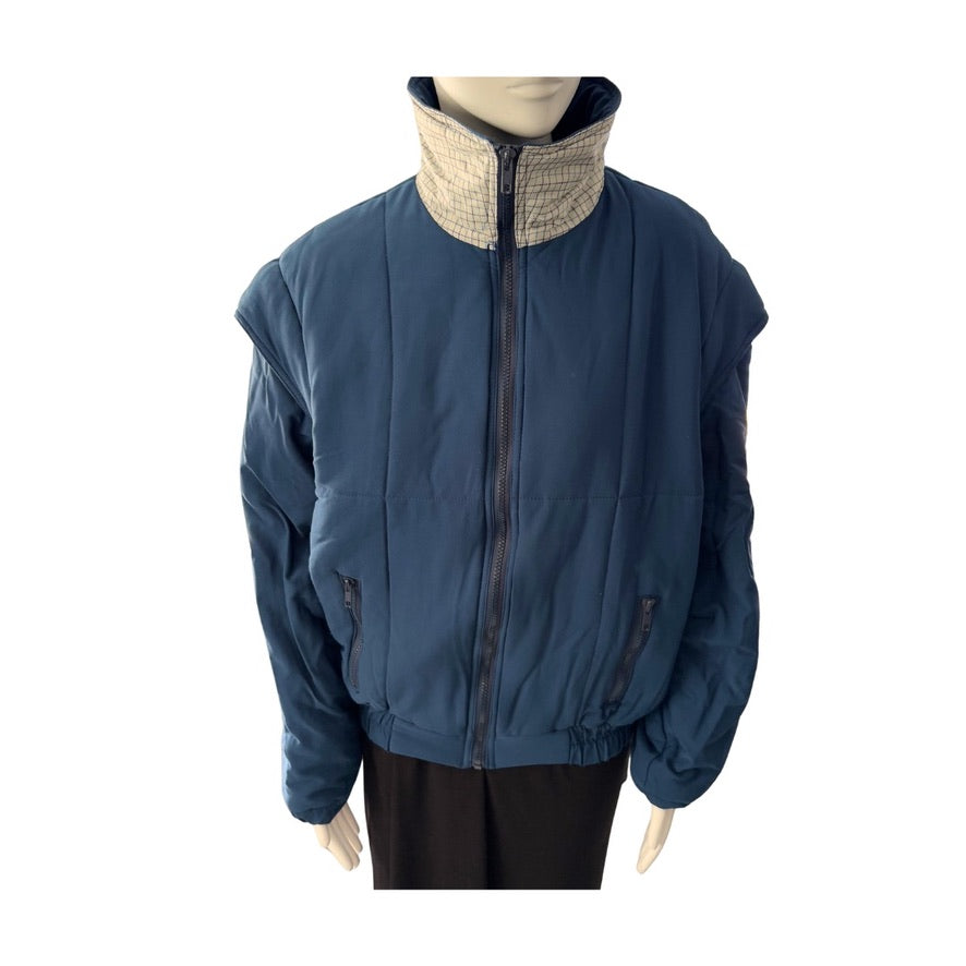 Blue jacket on a mannequin against a white background