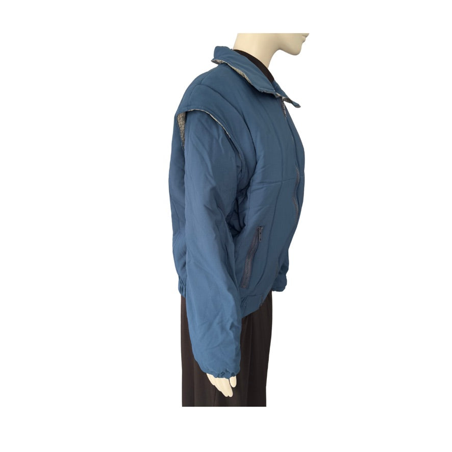 Blue jacket on a mannequin against a white background