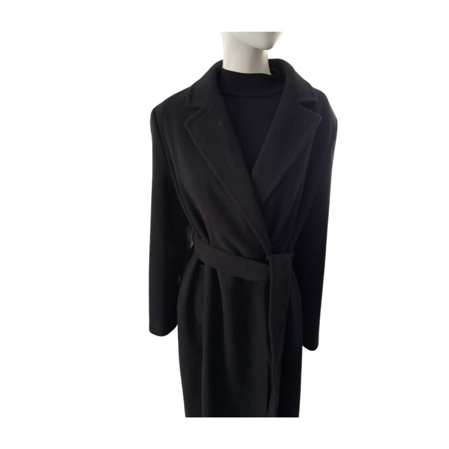 Black coat on a mannequin against a white background