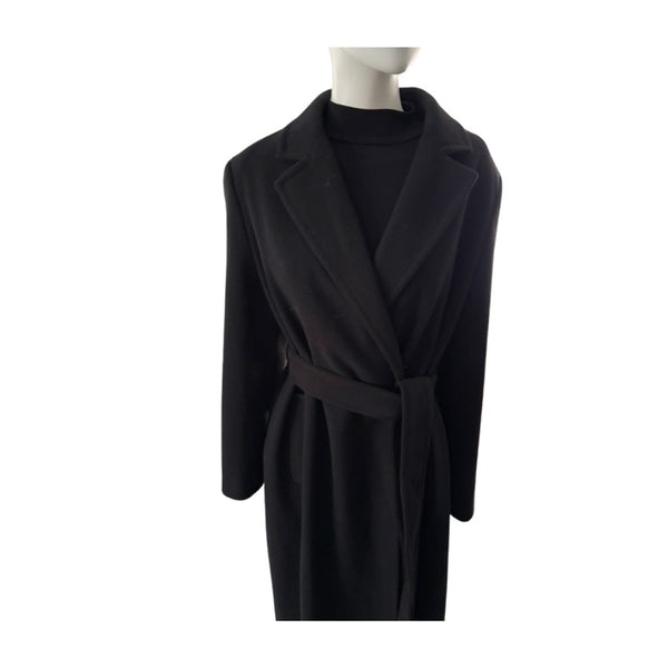 Black coat on a mannequin against a white background