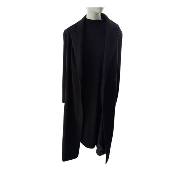 Black coat on a mannequin against a white background