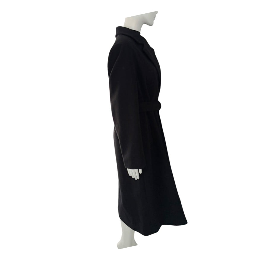 Black coat on a mannequin against a white background