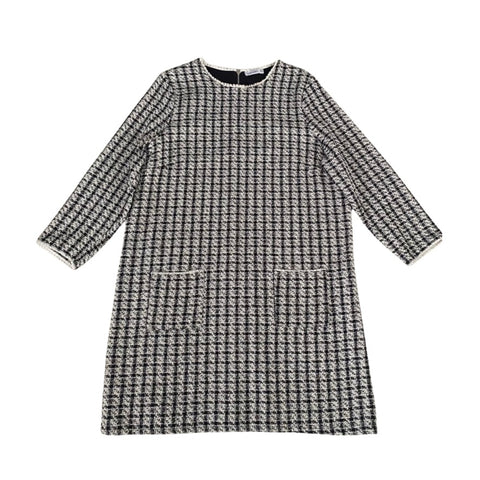 Black and white checkered dress on a white background