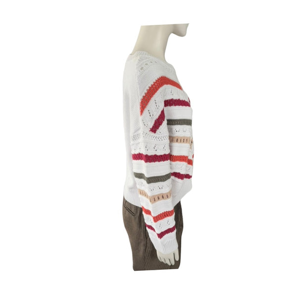 Mannequin wearing a colorful striped sweater on a white background