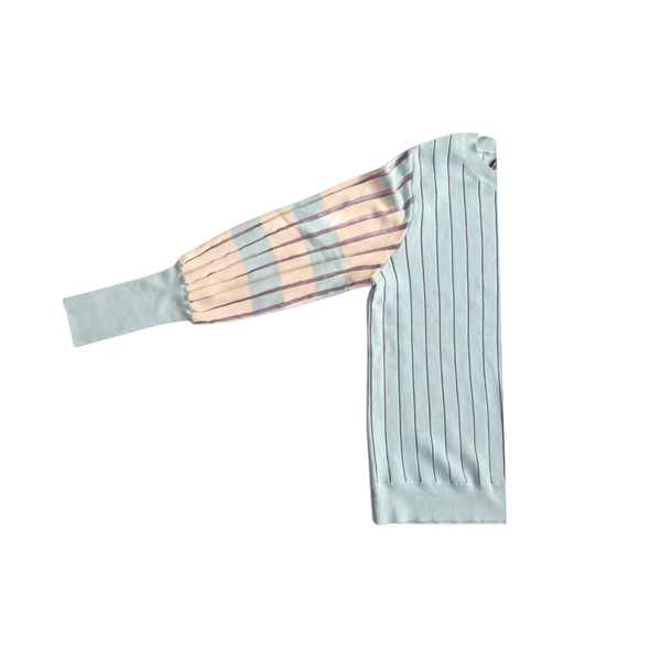 Light blue pleated dress with plaid pattern on a white background