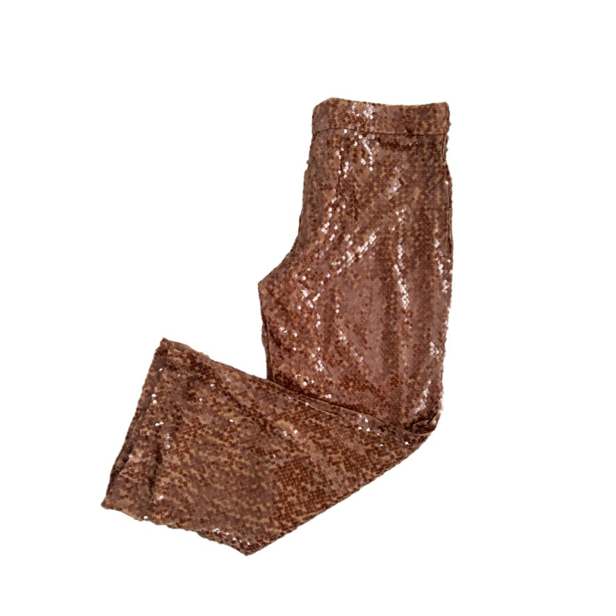 Pair of brown sequin leggings on a white background