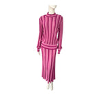 Mannequin wearing a pink striped outfit on a white background