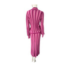 Mannequin wearing a pink and white striped outfit on a white background