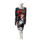 Floral patterned dress on a mannequin against a white background
