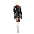 Black floral dress on a mannequin against a white background