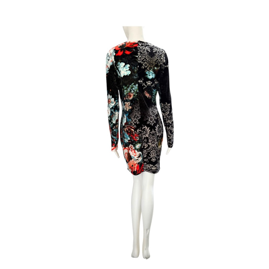 Black floral dress on a mannequin against a white background