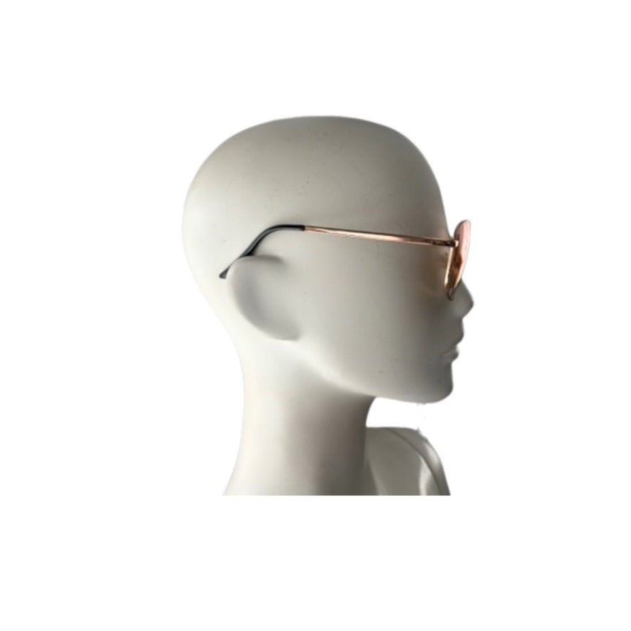 Sunglasses on a mannequin head against a white background