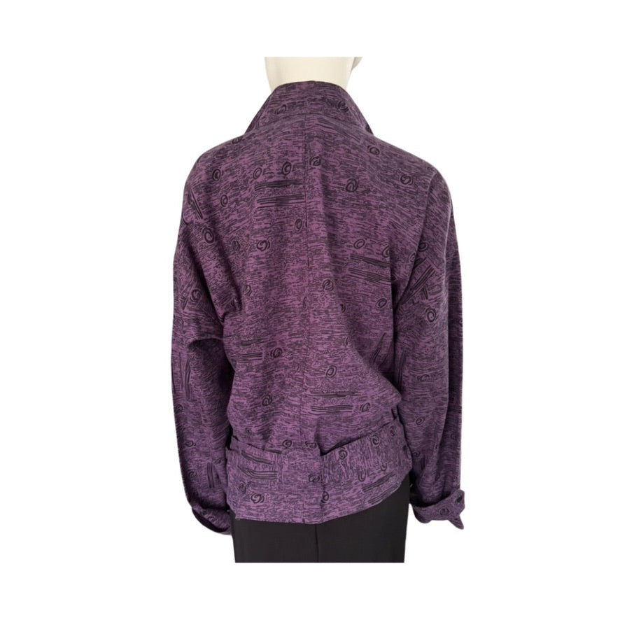 Purple jacket on a mannequin against a white background