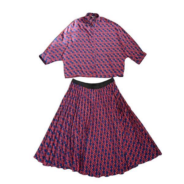 Red and blue patterned shirt and skirt set on a white background